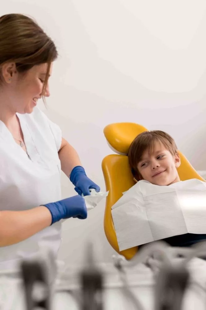 dentist-cleaning-child-s-teeth (1) (1).jpg